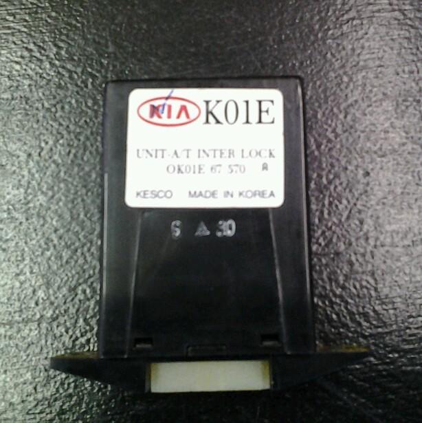 1999 kia sportage inter lock module unit a/t ok01e 67 570 