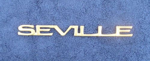 Cadillac seville gold fender emblem