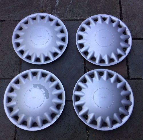 Complete set (4) of saab hubcap wheelcovers with rings and clips 16&#034; diam.