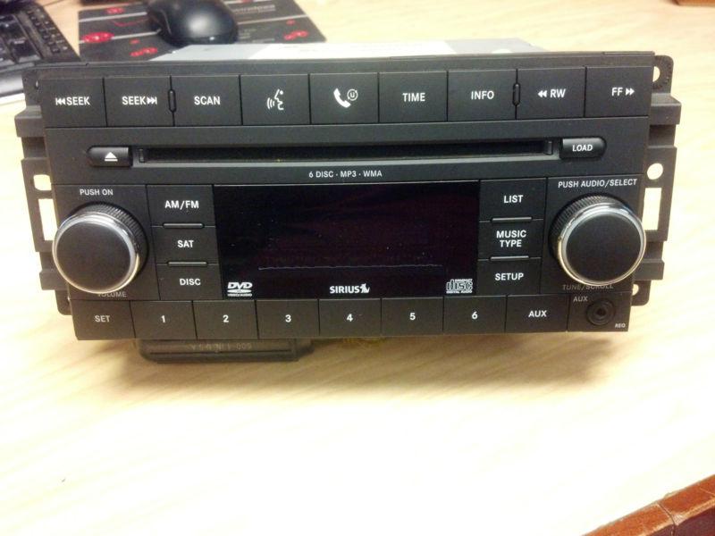 Chrysler Dodge Jeep 05064920AG AM/FM Stereo Radio with six-disc MP3 CD/DVD SIRUS, US $50.00, image 1