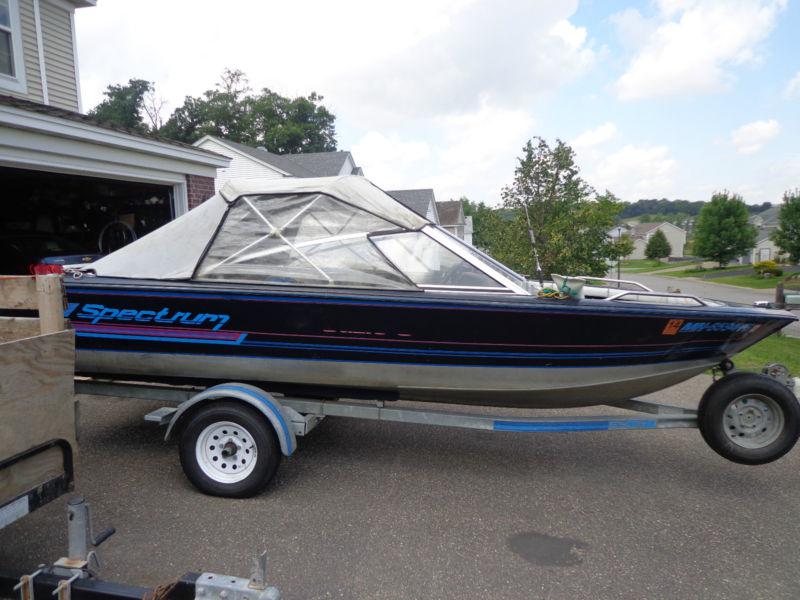 Full convertible top off of a 1989 spectrum blue fin boat