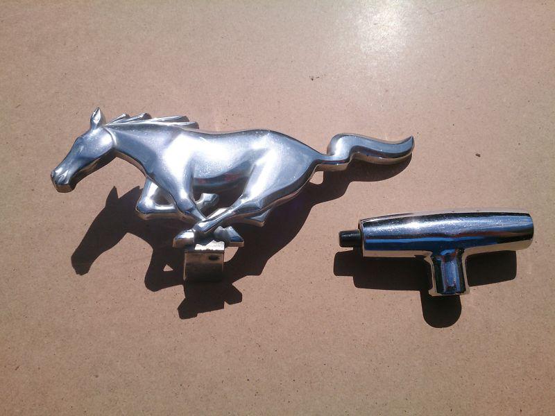 Early mustang grille emblem and "t" shifter handle
