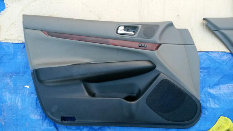 07 08 09 10 11 12 g35 g37 g 35 37 left front door panel black and tan with wood