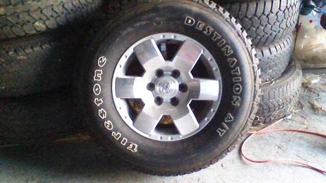 Set of  4-- 07-12 toyota fj cruiser oem 17"  wheels with tires  alloy aluminum