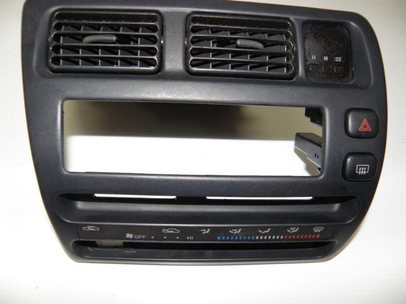Toyota corolla 4 door center radio panel 93,94,95,96,97 if it has pass. airbag