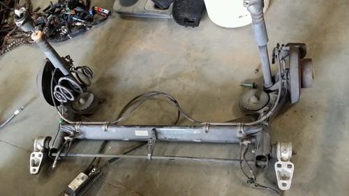 00 vw passat wagon rear solid axle beam assembly rear suspension fwd oem