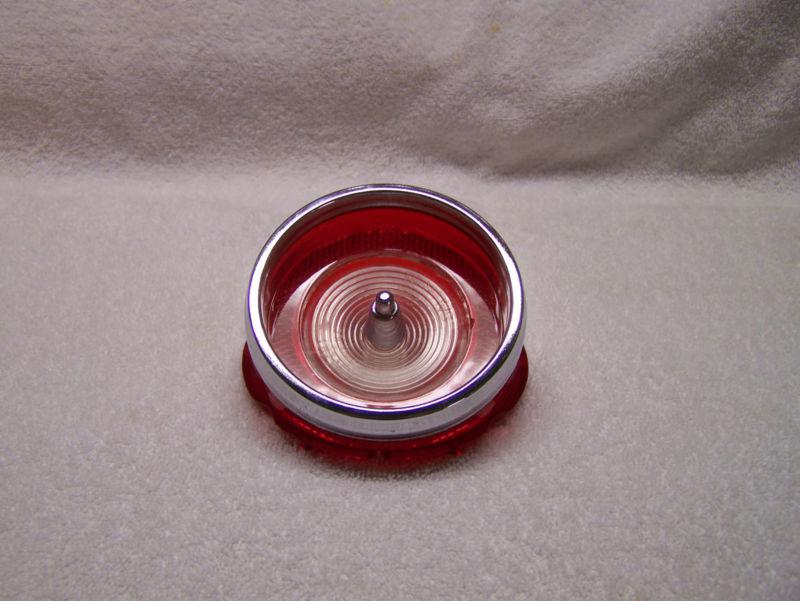 1965 impala back up lense, new,repro, with shelf wear. good cond.. no reserve