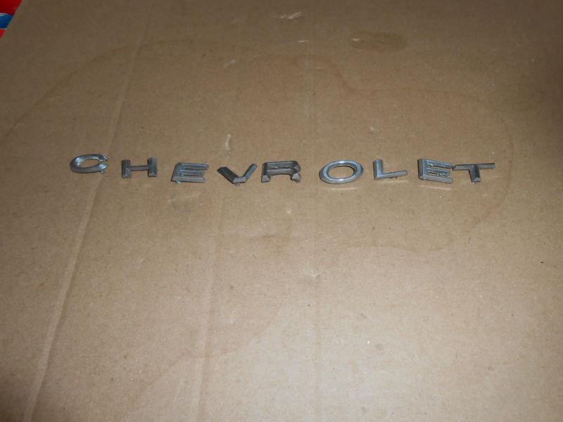 1964-65 chevrolet emblem  ( individual letters)  w/posts