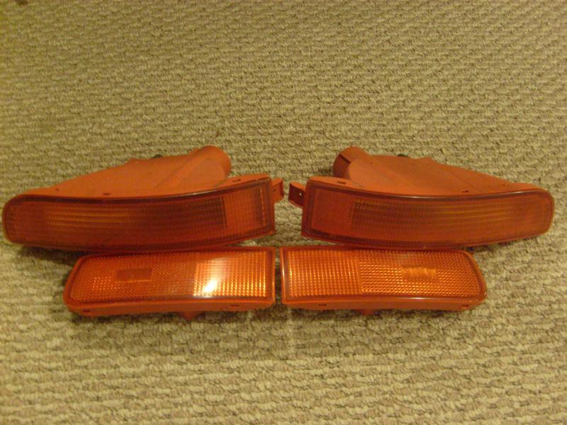 1997 nissan maxima front signal lamps cover orange oem used 95-99