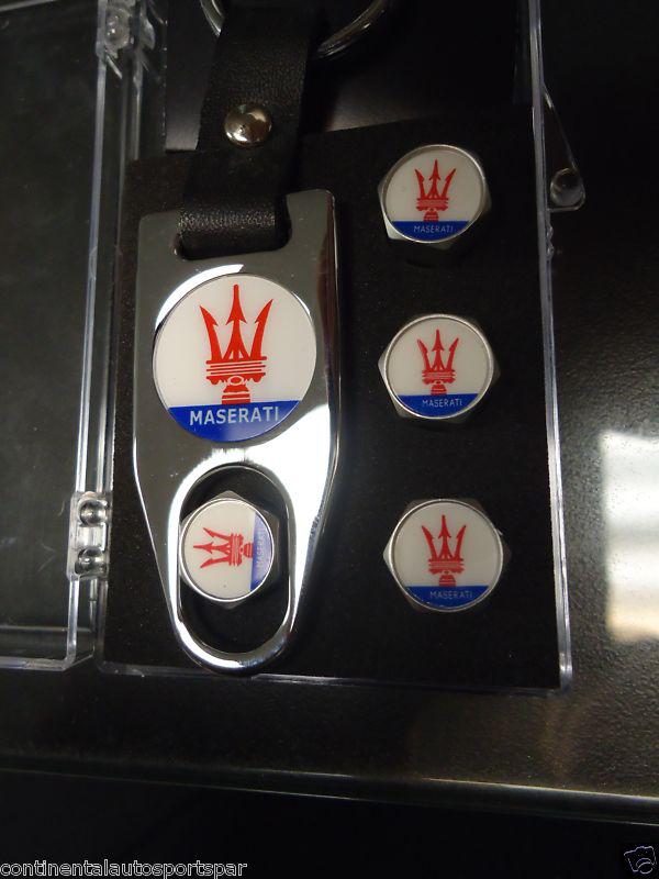 Aftermarket maserati trident set of 4 silver valve stem caps with keychain tool