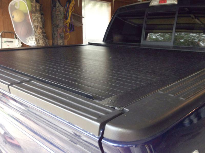 Used bak rollbak retractable tonneau bed cover for 2004-2012 ford f-150 - 5.5 ft