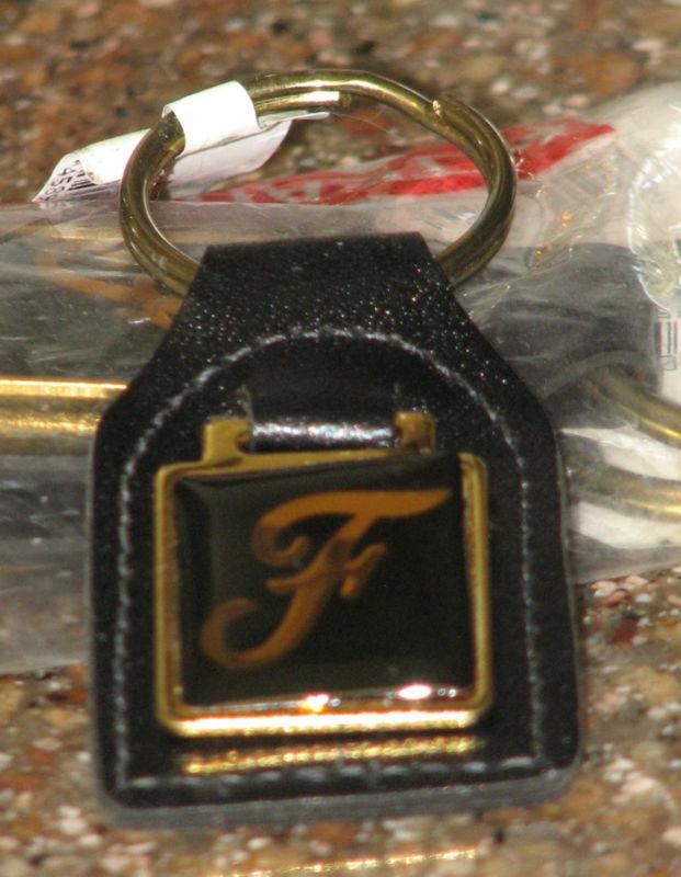 Keychain  brass plate letter f with black leather fob 3 per bag nib
