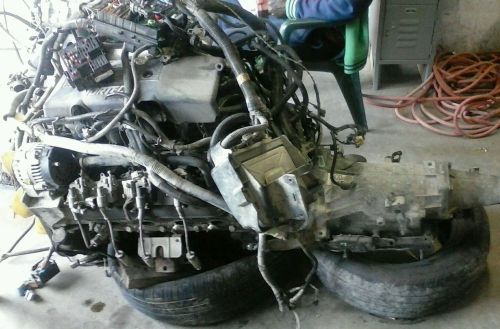 5.3  v8 chevy engine complete with wiring harness and new rebuilt transmission