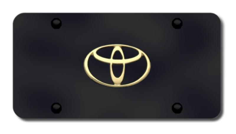 Toyota logo gold on black license plate made in usa genuine