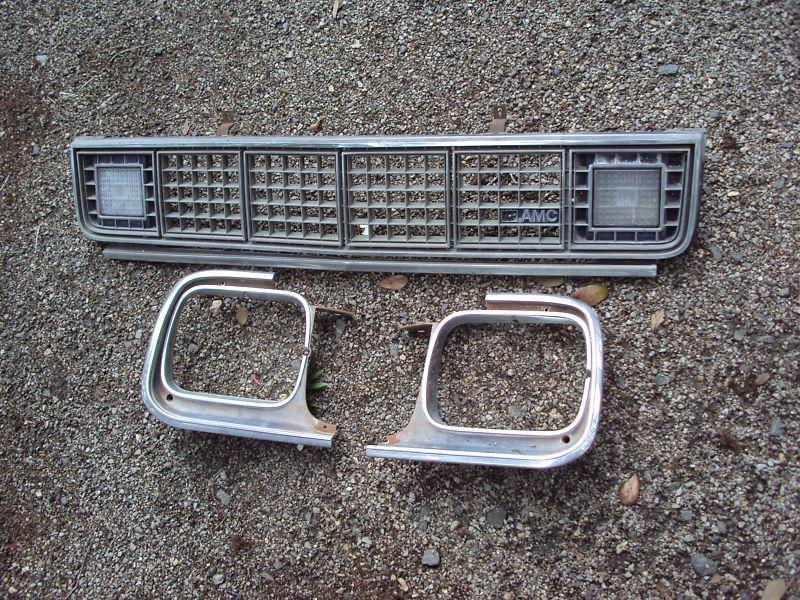 Amc concord 1978 grill w/ headlight doors n/r