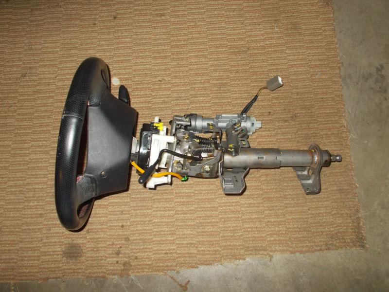 2005 hyundai tiburon steering column. includes steering wheel and the key