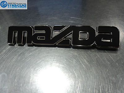 Mazda rx-7 1979-1980 new oem front black mazda logo emblem bardge 8871-51-771b
