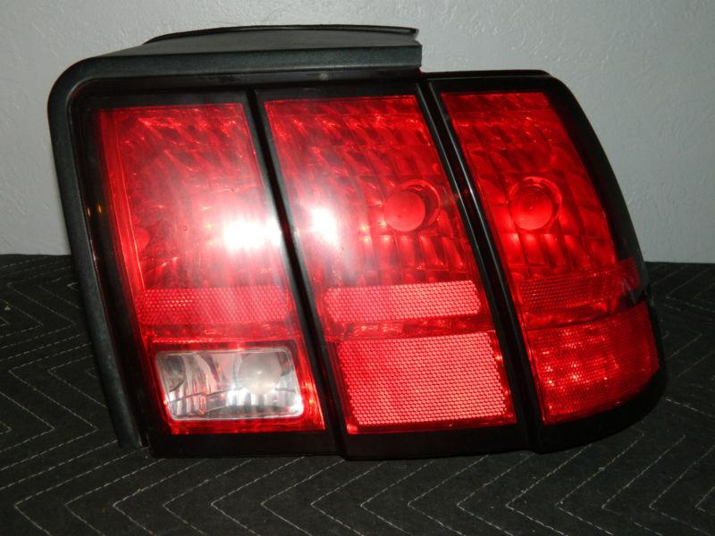 Oem 1999-2004 ford mustang right /  passenger  side tail light assembly 