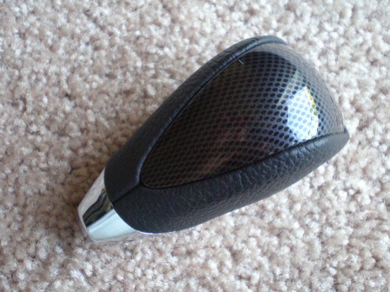 <p#40> oem 2011-2013 toyota sienna carbon shift knob