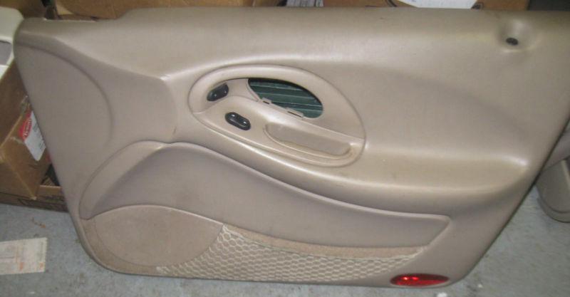 Ford taurus passenger door trim panel original equipment  1996-1999