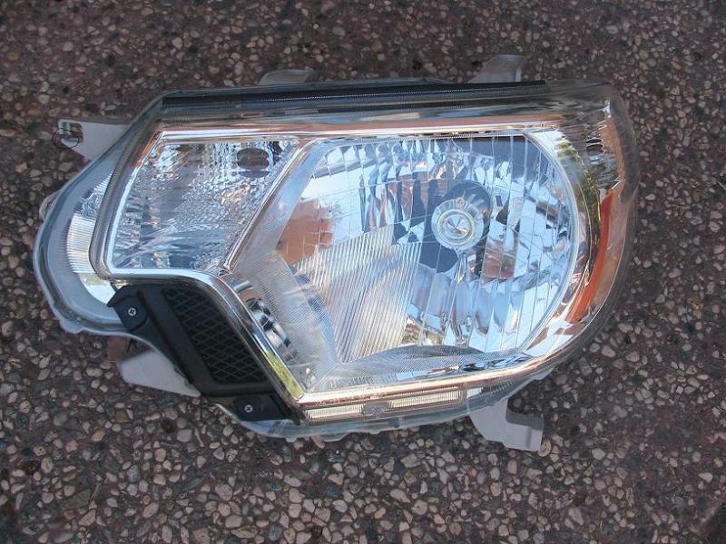 2012-13 toyota tacoma oem left headlight