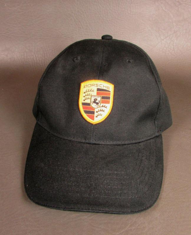 Black porsche baseball cap gold crest        adjustable for a perfect fit