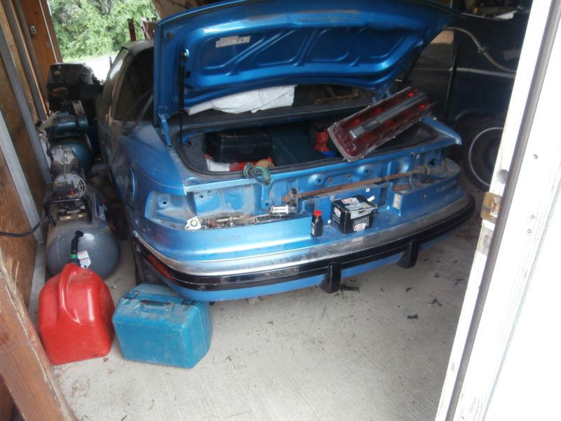 1990 BUICK REATTA PARTS CAR PLUS EXTRA GOOD MOTOR AND A TRUNK LOAD OF PARTS, US $575.00, image 4