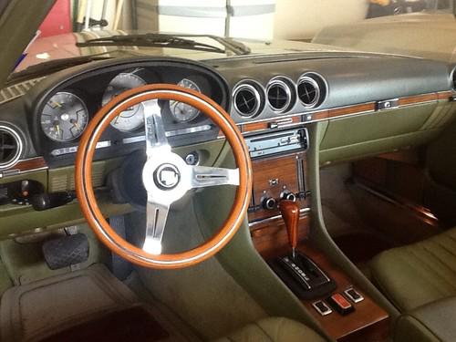 Nardi classic wood steering wheel and horn button.