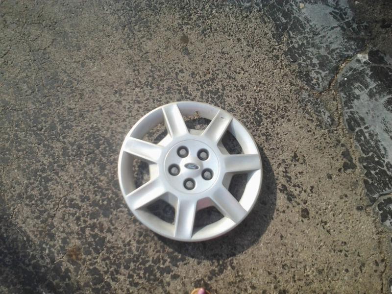 Ford taurus factory hubcap p/n: 4f13-1130-ba