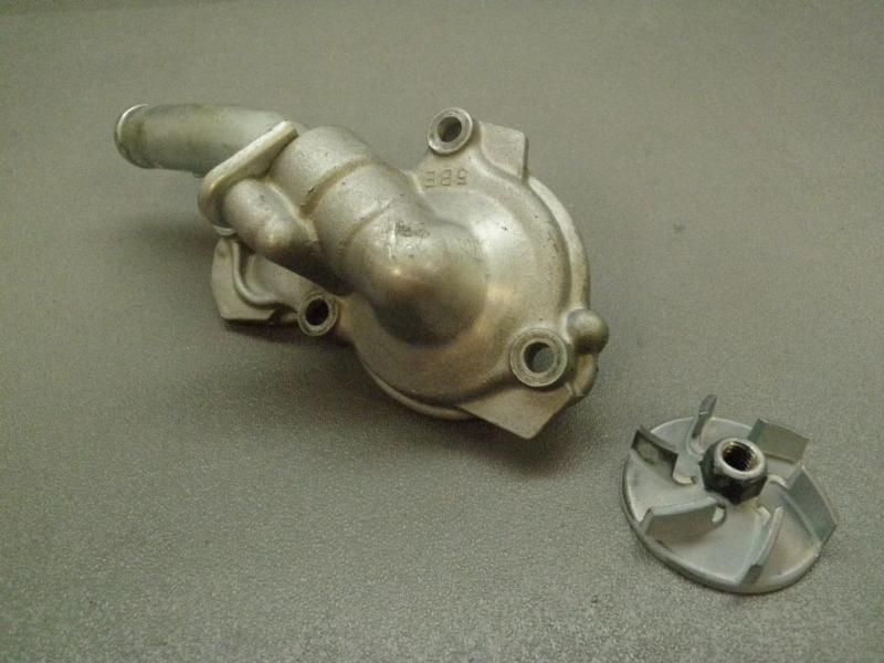 Water pump cover/pipe w/impellar yz 450 f 08 (06/07/09 wr/250)