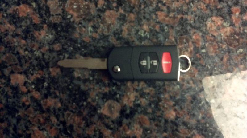 Uncut mazda keyless remote key 3 5 6 cx-7 cx-9 rx8 fcc id: kpu41788 3 button