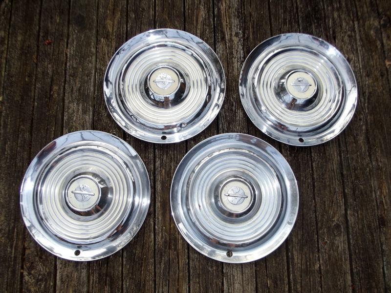 54 55 olds holiday super 88 hubcaps wheel covers oem original - set of 4