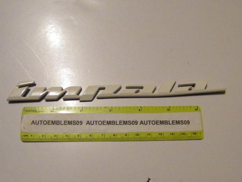 Chevy white impala 7 11/16" emblem used