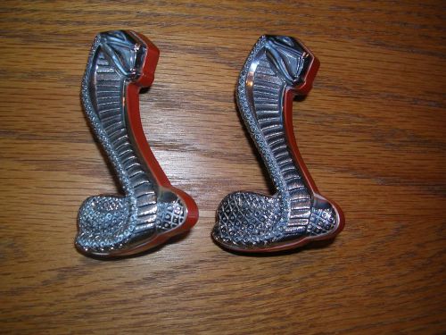 1971 ford torino cobra emblems       mint!    pair.  part # diob-8216-ba