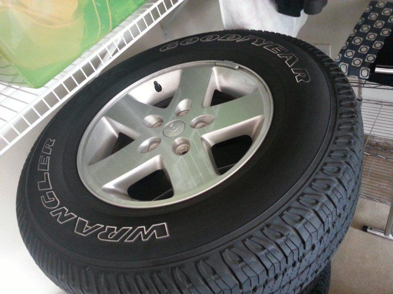31" wrangler goodyear tires, on 17" wheels.  ***5 tire & wheel package***