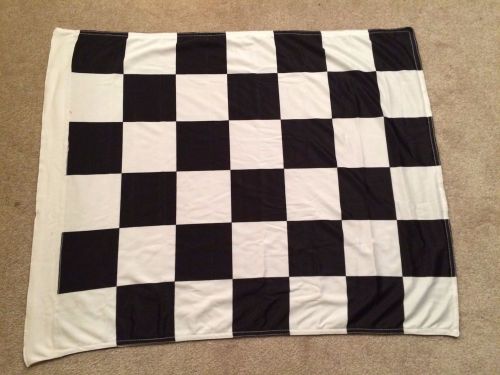 Racing chequered flags,yellow, red, black, black &amp; white .
