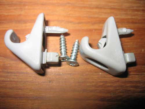 1998-2002 toyota corolla oem gray  clip hooks (2) with screws