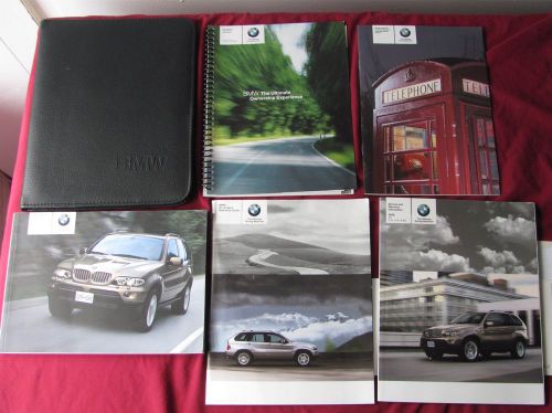 Bmw 2006 x5 owner&#039;s handbook set with leather case 01410159867