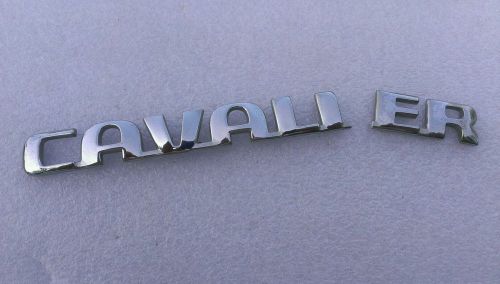 Broken chevrolet cavalier emblem nameplate badge logo