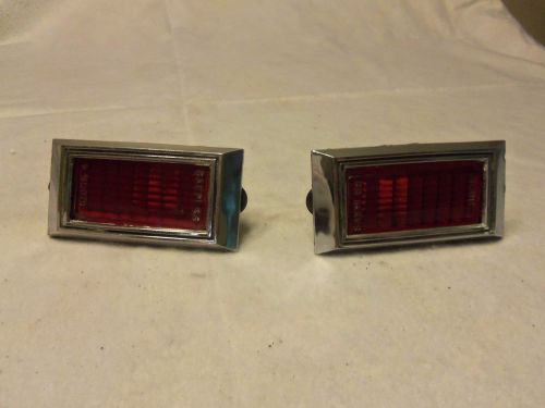 Used pair 1968 chevy camaro rear quarter marker lamp assemblies red with bezels