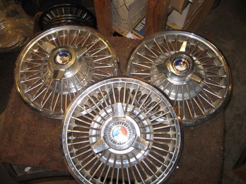 14"  1965 ford spinner  hollow wire hubcaps set of  3