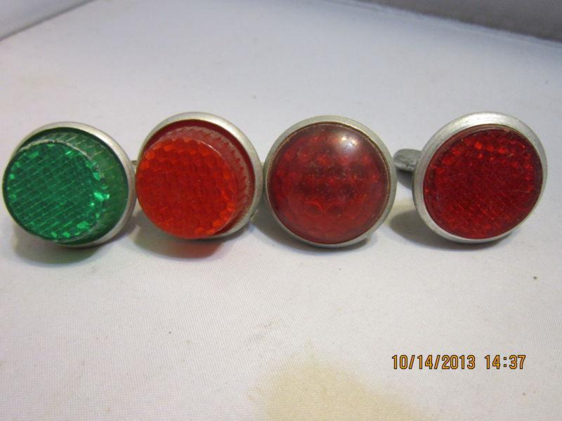 4 vintage sm. reflectors 3 red  1 green, different  (check the pictures)