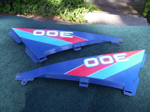 1994 poaris 300 2x4 right and left fuel tank covers.