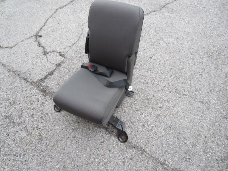 2009 ford f250 center seat console...new...oem...grey!!