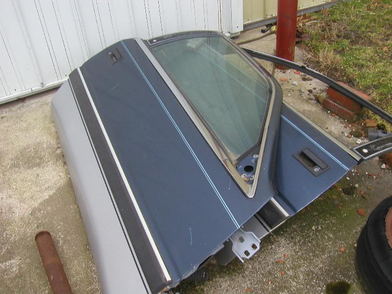 Pair of late 1980's? chrysler lebaron coupe doors
