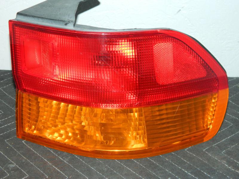 Oem 2002-2004 honda odysse right/  passenger side tail light assembly 