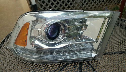 Dodge ram chrome rh headlight oem nice used. 2013-2016. broken tabs.