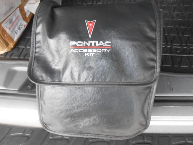 Pontiac trunk roadside kit complete and new ...spot light, gloves, air hose etc