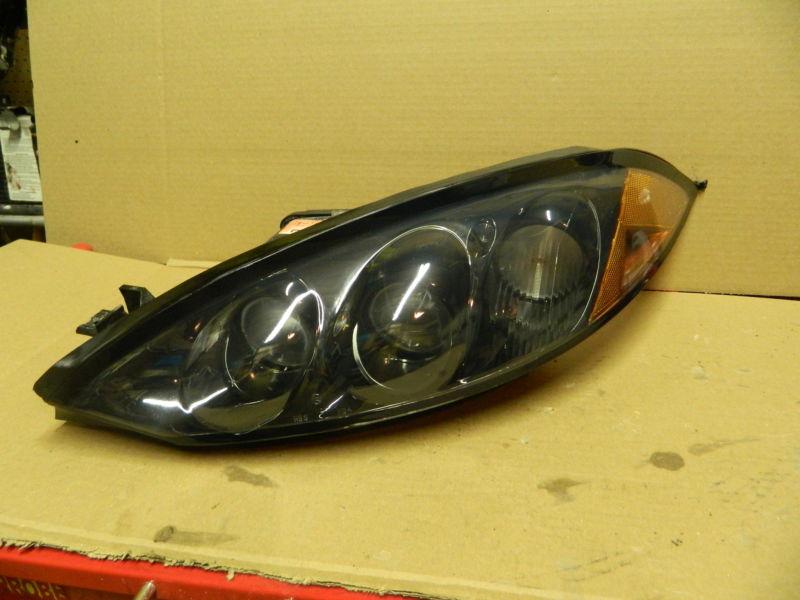 Mercury cougar lh  headlight assembly 99 00 drivers side