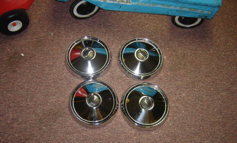 Studebaker dog dish hub cap set of 4 nice shiney